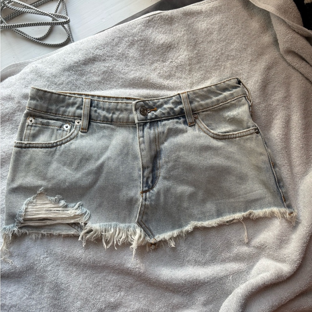 new with tags Distressed skylight blue Denim skirt with frayed hem